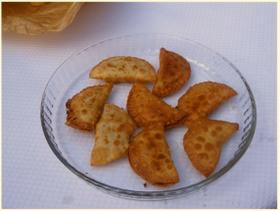 Empanadilles amb bolets, ceba, ànec i foie